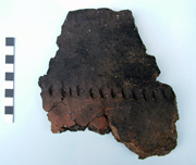 A sherd from the same Deverel Rimbury cremation urn pictured above
