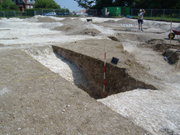 A section through the Causewayed ring-ditch monument at Bradstow School