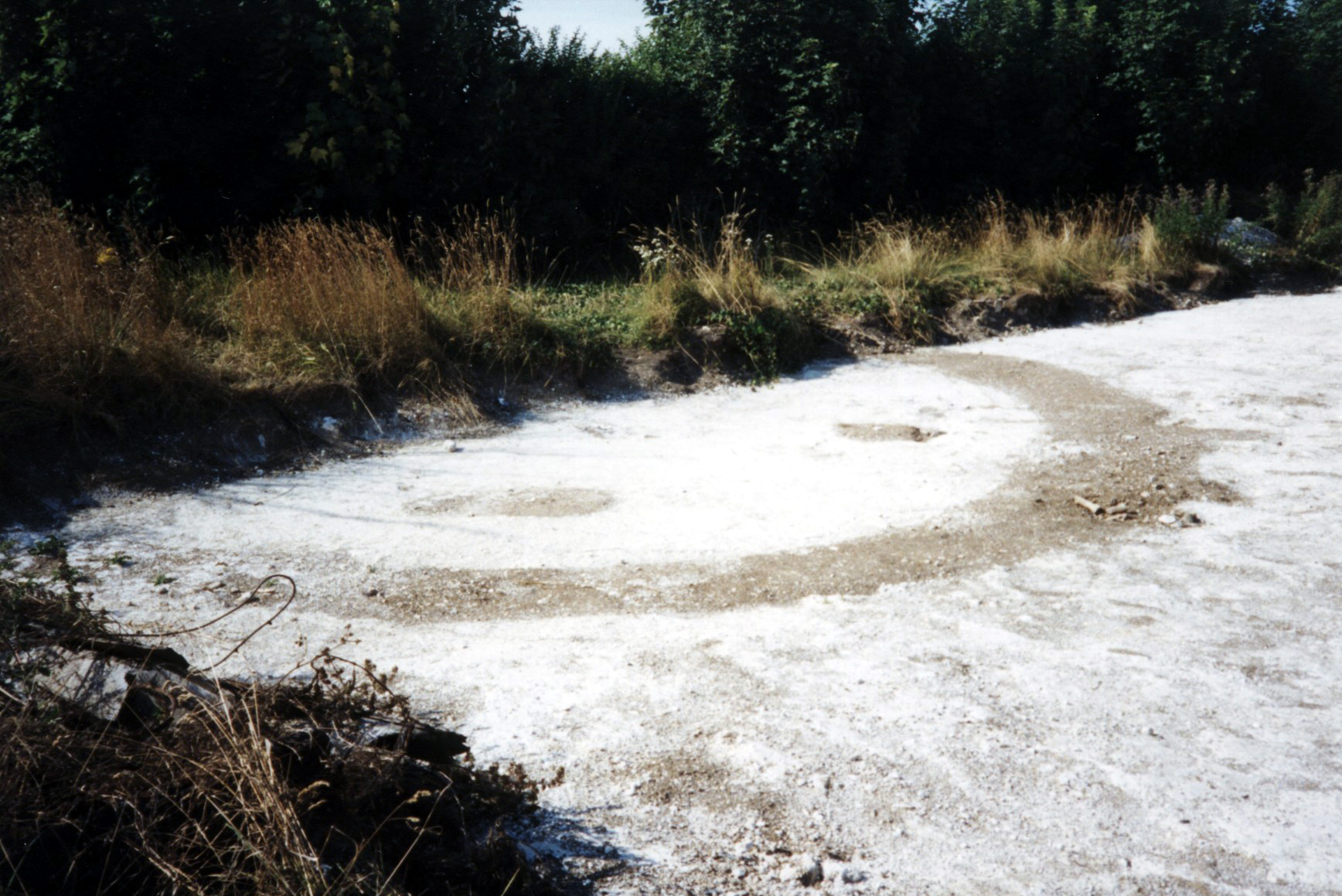 The causewayed roundbarrow as first exposed