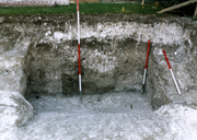 Looking at the baulk section of the ditch, showing an earlier intervention