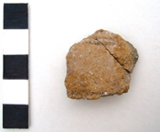 Beaker sherd from under the primary chalk backfill of the Beaker grave