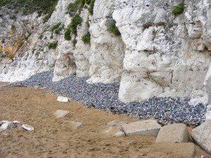 Inage of Shingle at the foot of the cliff